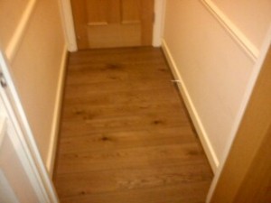 Here we have laid Epoque 162mm Umber Brown in a Hallway.