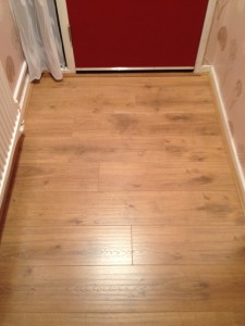 Here we have laid 8mm laminate in a Hallway entrance. This Laminate is perfect for high traffic areas as it is very durable and has a scratch resistant coating perfect entrance ways.